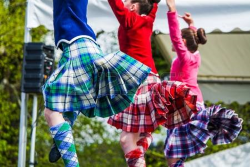 74588801-highland-dancer-at-highland-games-in-scotland.png